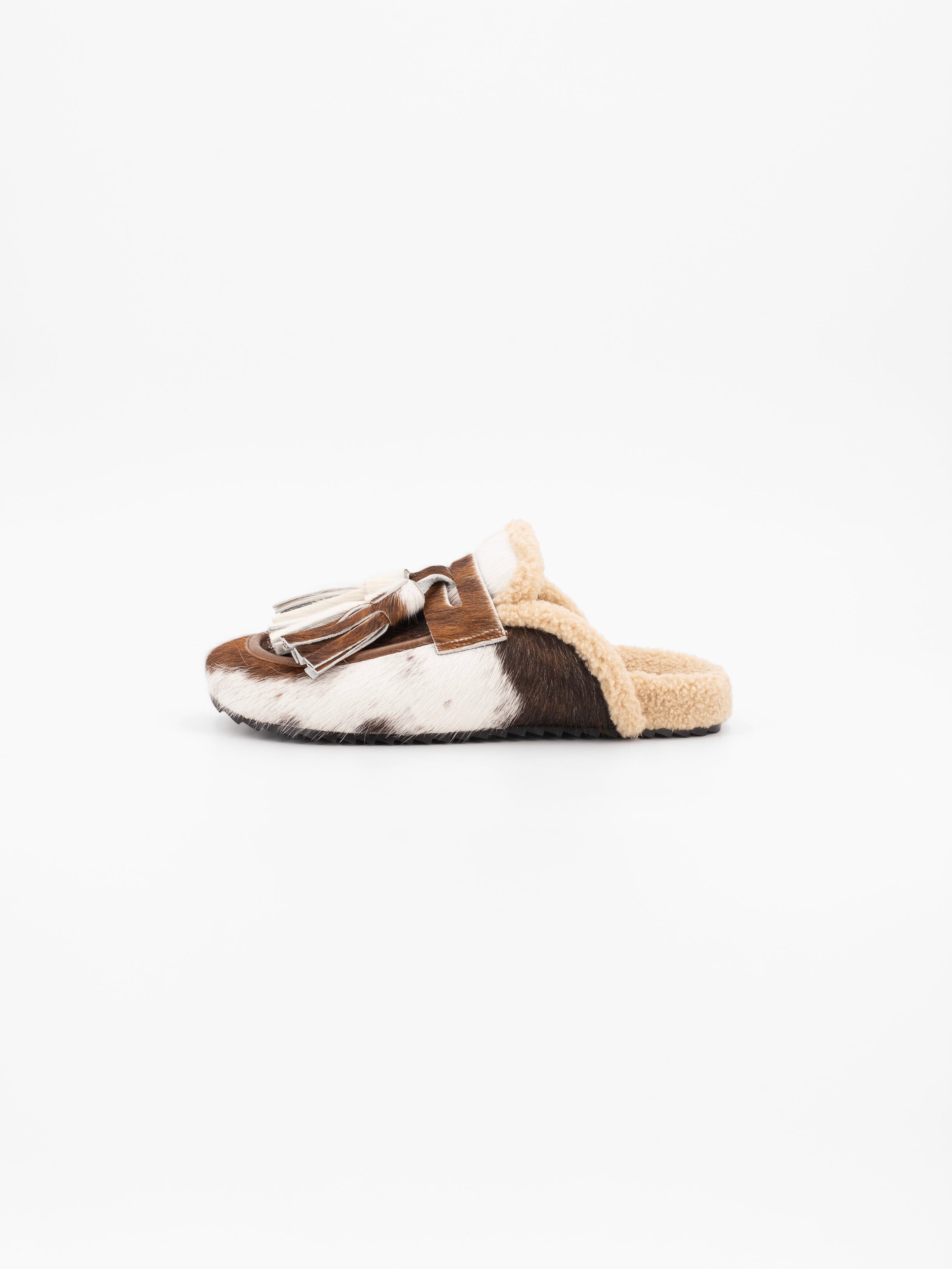 ARIANA COWHAIR TASSELED MULE SLIPPER
